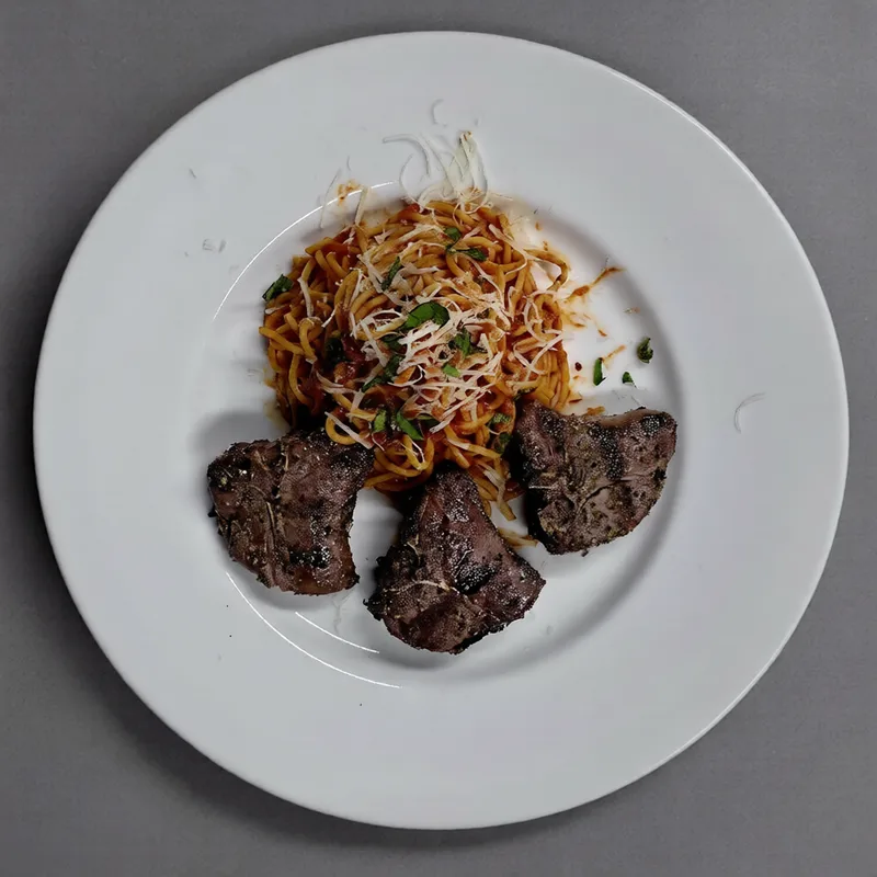 Grilled lamb chops with spaghetti in tomato sauce