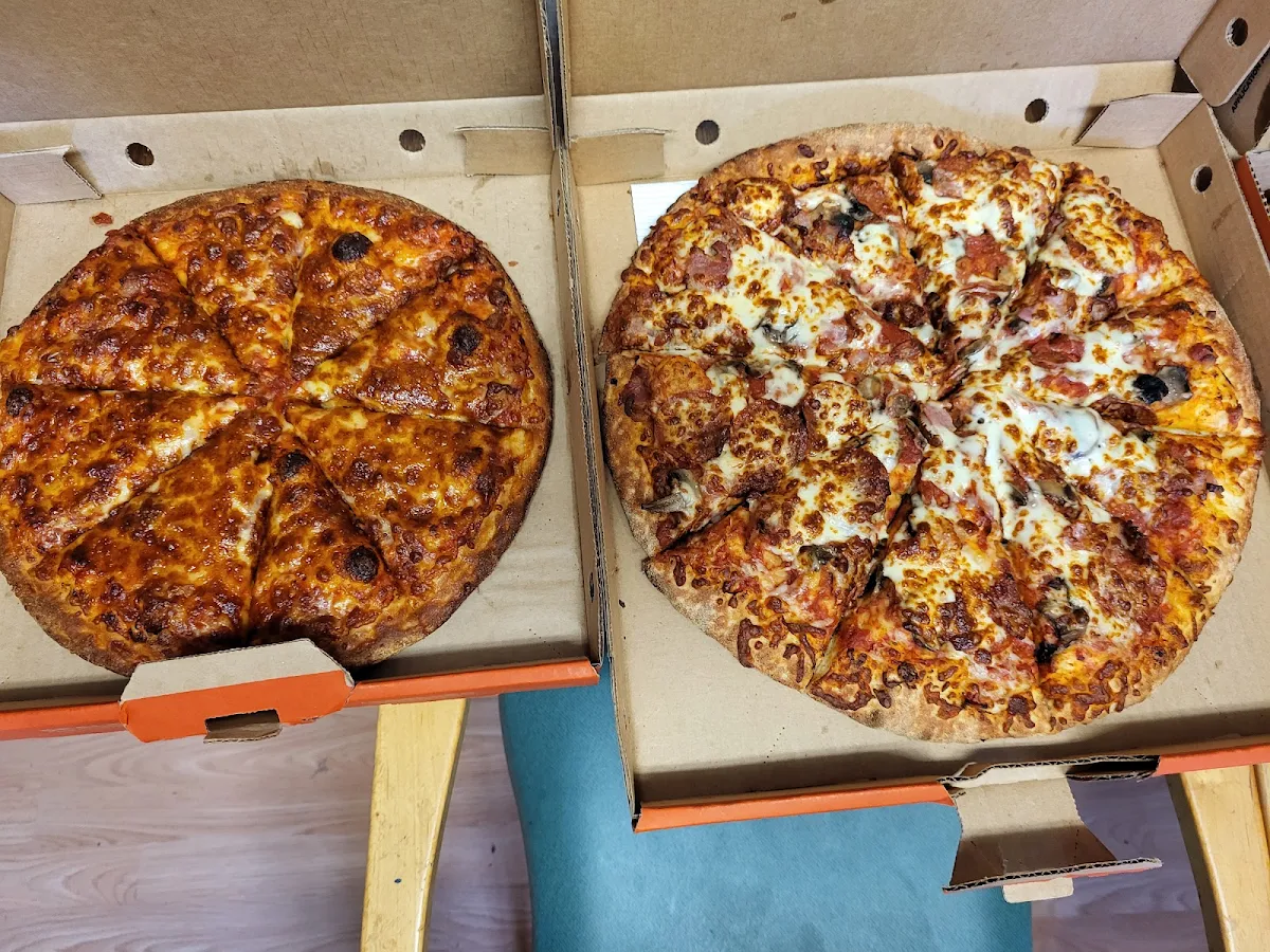 Custom Pizza Cheese and Bacon and a Canadian Pizza Pepperoni Bacon and Mushroom