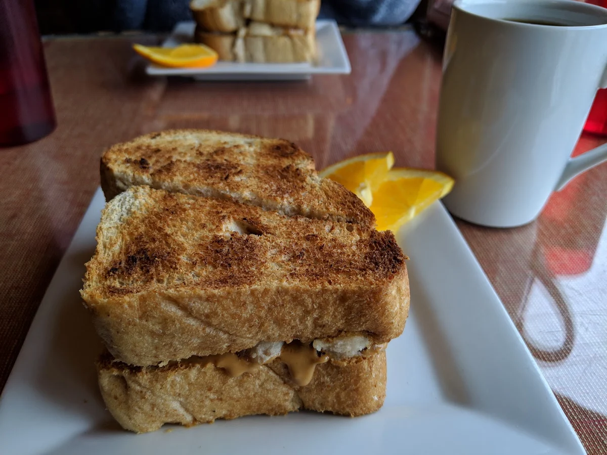 Peanut Butter and Banana Sandwich with a Cup of Decaf to Start the Day