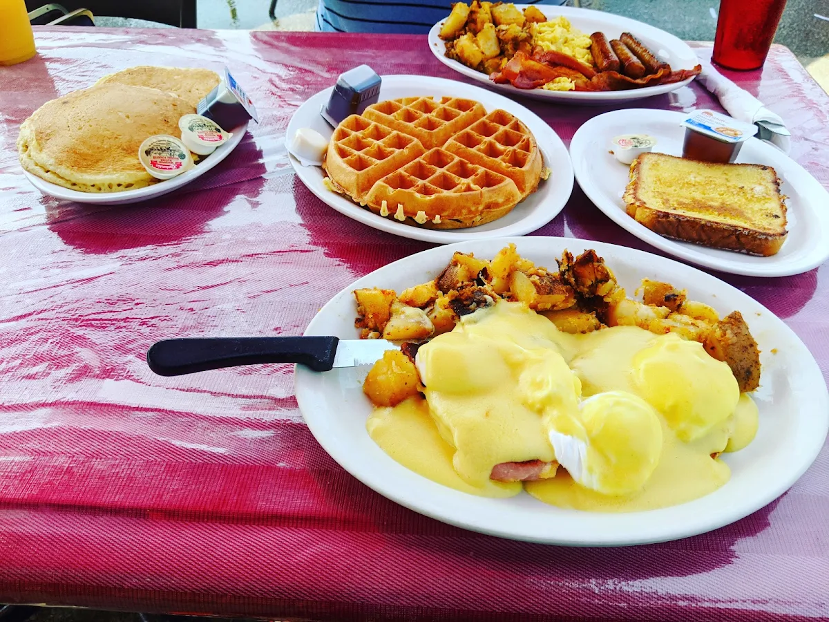 Eggs Benedict Fresh Squeezed Orange Juice French Toast Pancakes Waffle