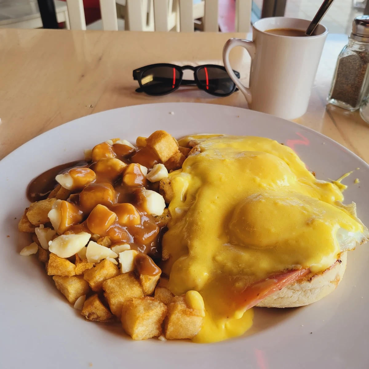 Eggs Benedict with Breakfast Poutine