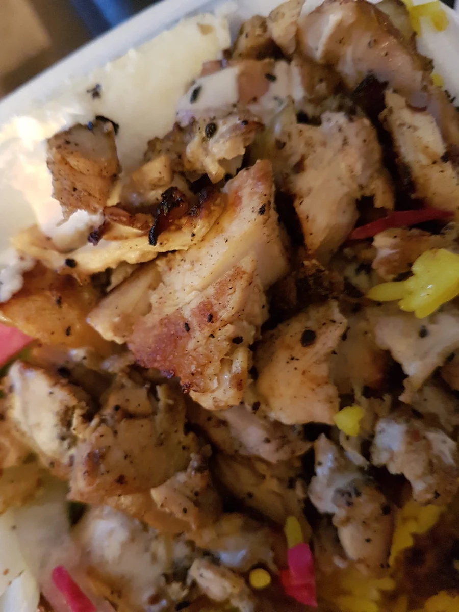 Close Up on Garlic Sauce and Chicken Shawarma