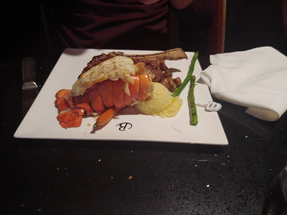 Cowboy Steak with Lobster Tail