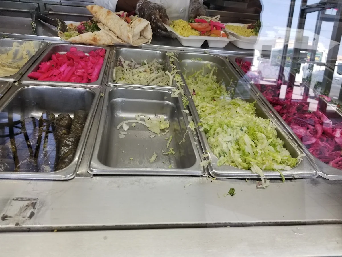 Hummus Lettuce Pickled Beets and Garlic Sauce