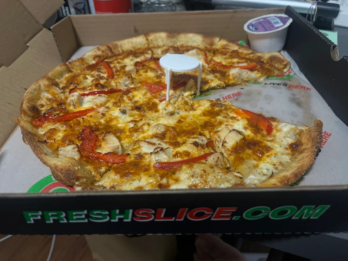 Half Vegetarian and Half Chicken Curry Pizza