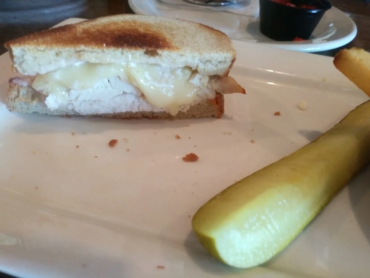 Turkey Brie & Cranberry Sandwich on Rye with Poutine