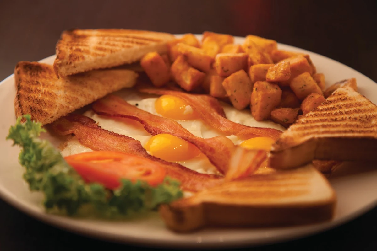 Three Eggs Breakfast Potatoes Toast & Bacon