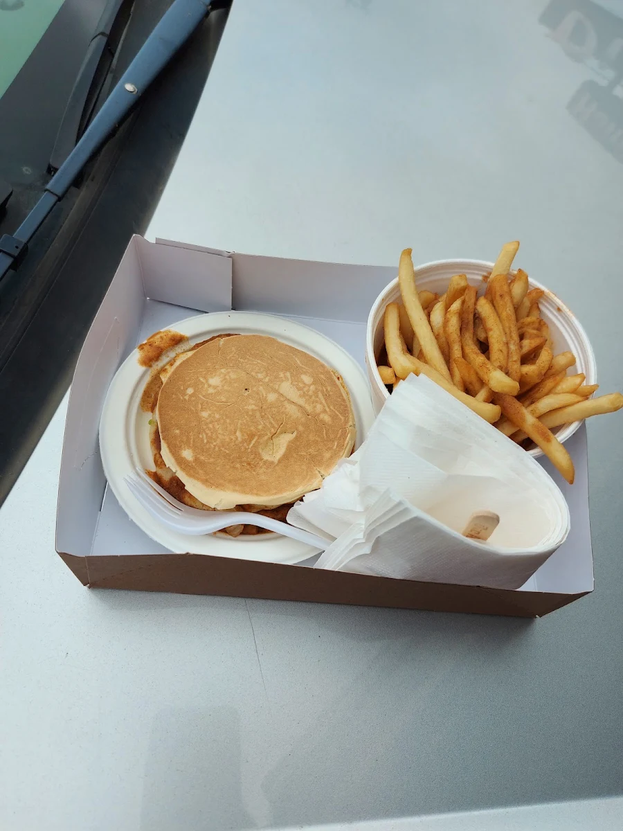 All Dressed Cheeseburger with Hot Sauce Fries and Sauce as Well