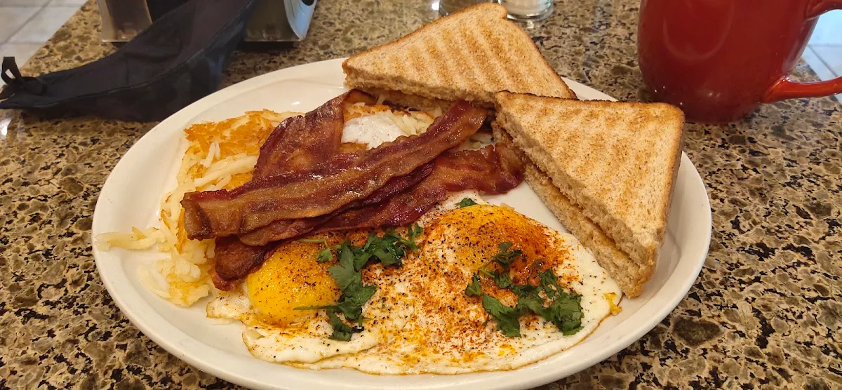 Fried Eggs Bacon and Cheese Sandwich