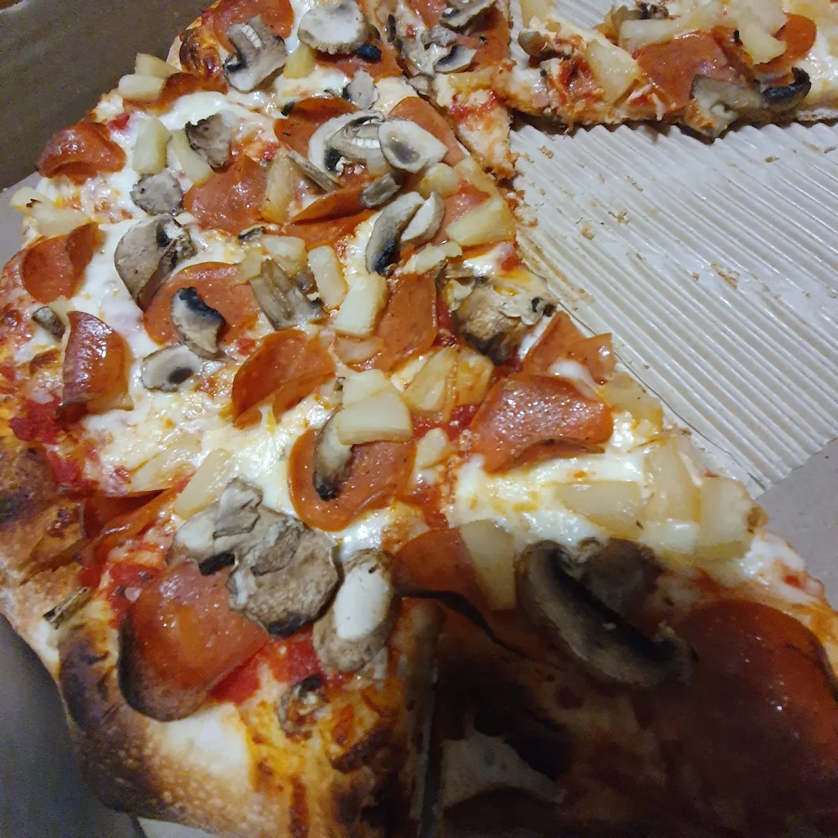Pepperoni Pineapple and Mushroom Pizza