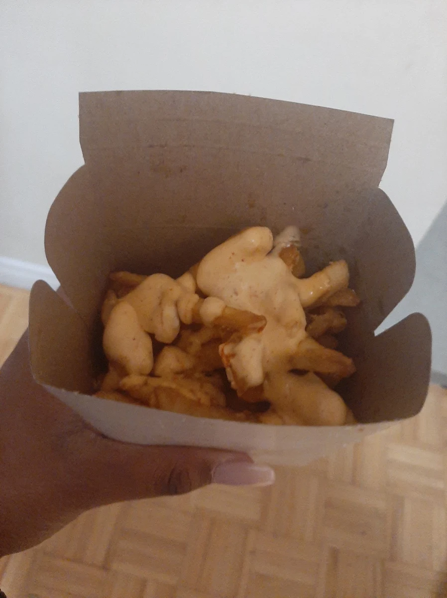 Butter Chicken Poutine and Pop