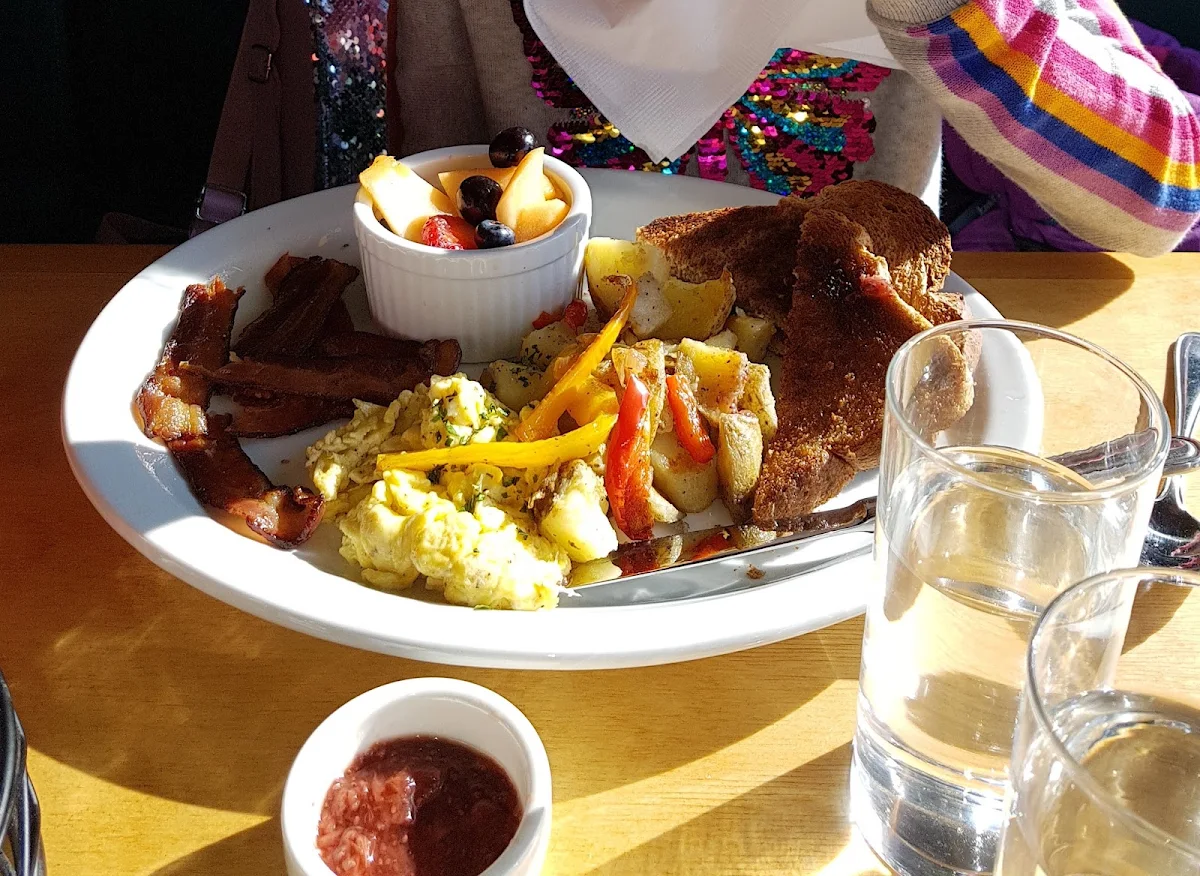 One Egg Breakfast with Bacon Toast Home Fries and Fruit