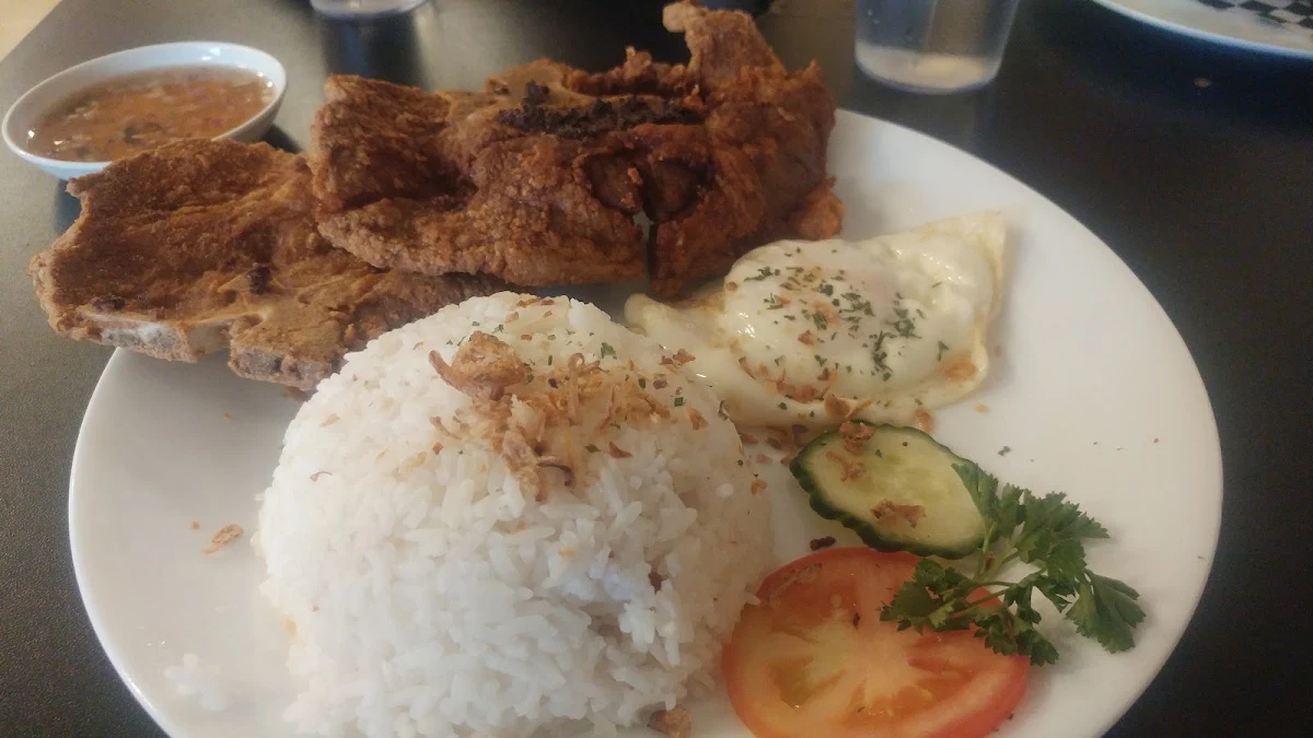 Fried Pork Chops and Rice with Fried Egg