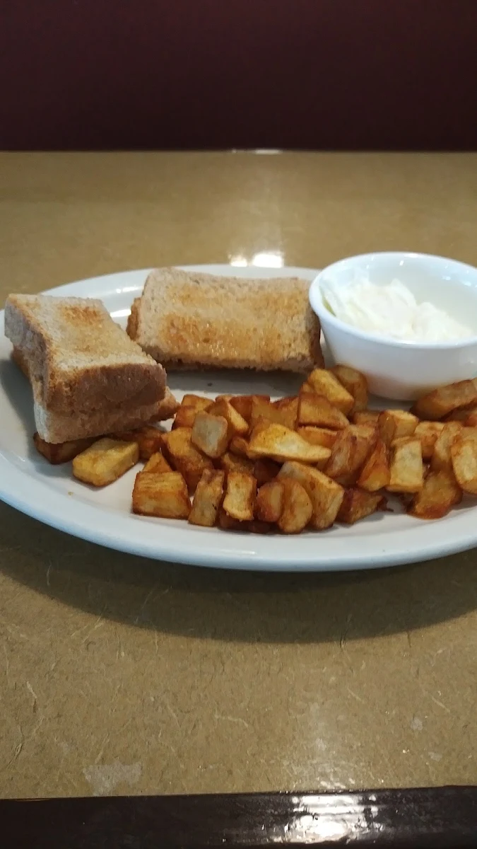 Breakfast Poached Eggs Toast and Home Fries