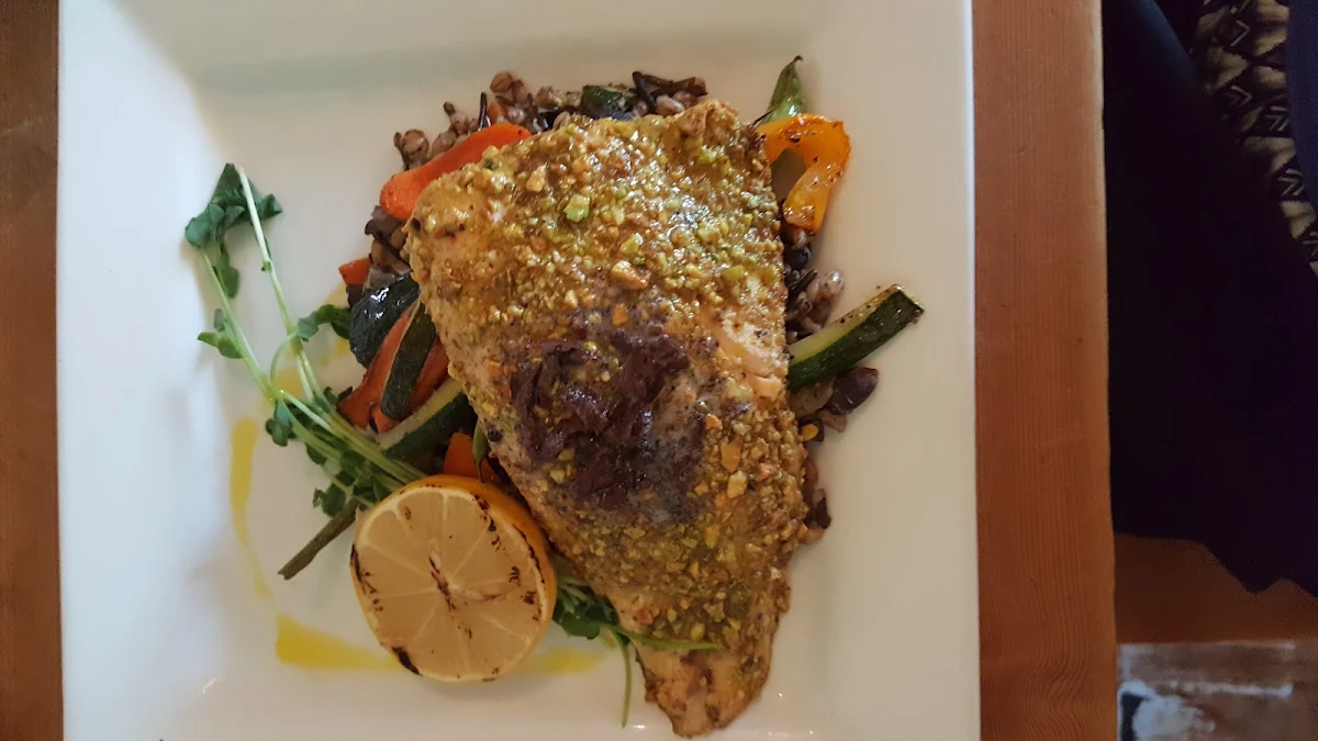 Pistachio Crusted Arctic Char with Sun Dried Olive Truffle Butter and Mushroom Herb Risotto
