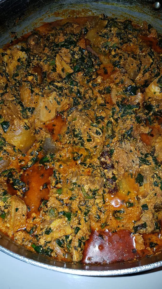 Goat Meat with Efo Riro Okra Ogbona Efo Egusi Ewedu Gbegiri and Any Solid Like Amala EBA Lafun Pando