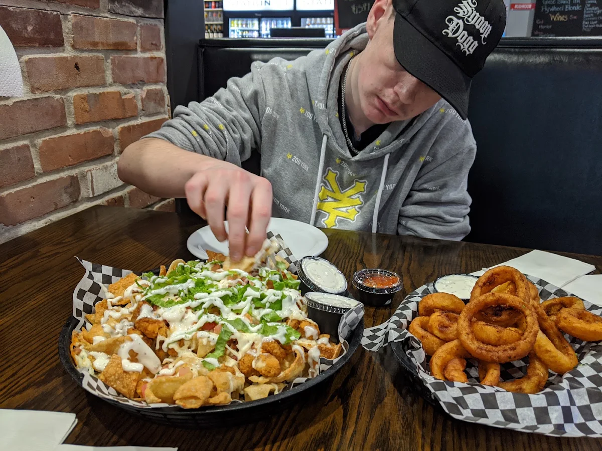 Chicken Bacon Ranch Nachos and Onion Rings