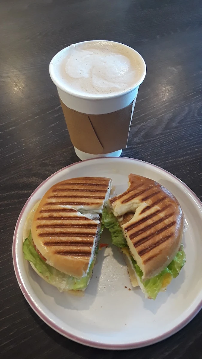 Latte and Bagel Sandwich Bacon and Egg