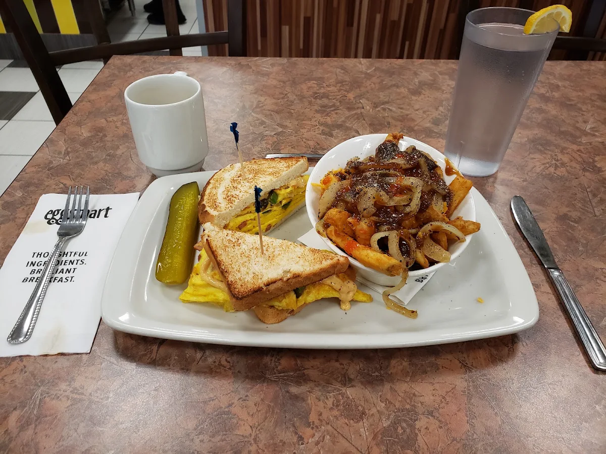 Toasted Western with Elevated Fries Cheese Sauteed Onions and Gravy or Hollandaise