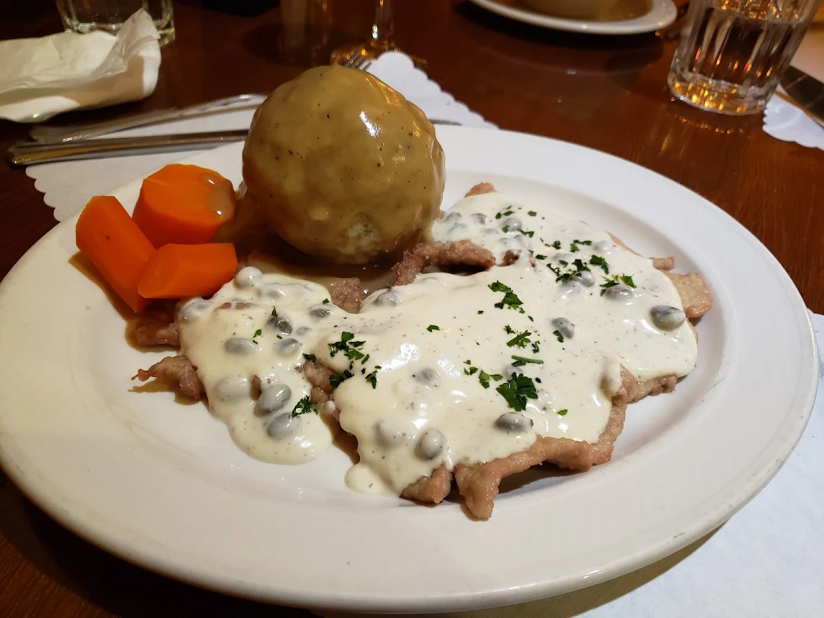 Tirolerschnitzel Pork Cutlet in Seasoned Sour Cream Sauce