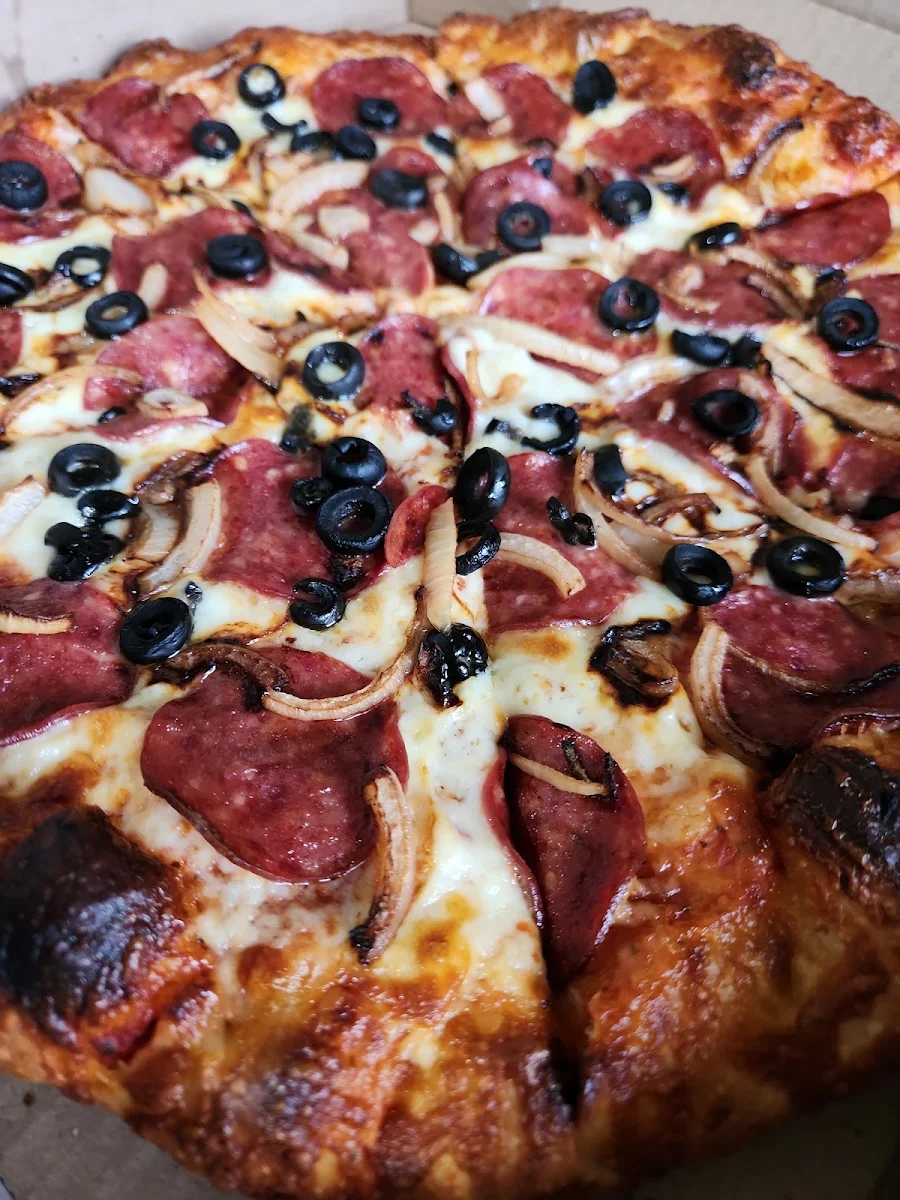 Pepperoni Olive and Red Onion Pizza