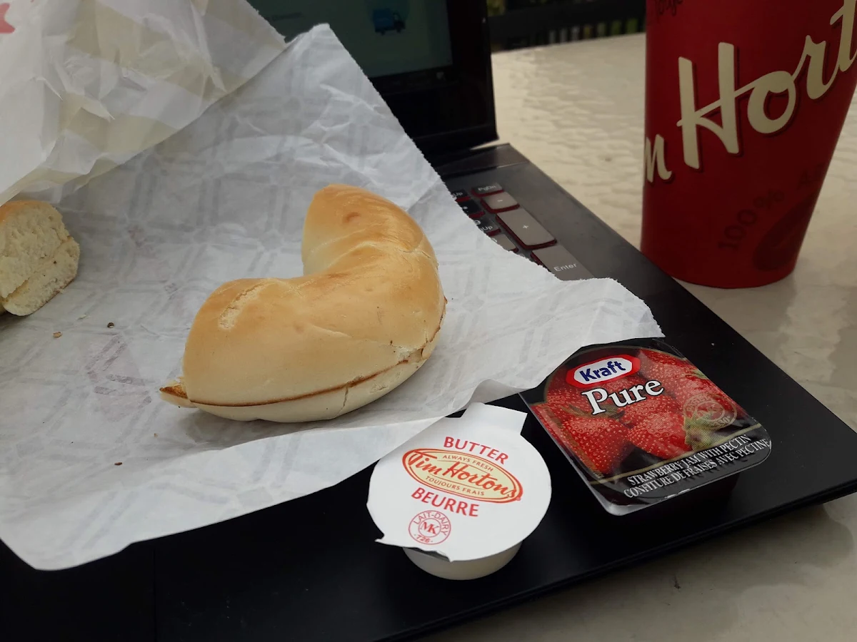 Plain Bagel with Jam and Butter on the Side