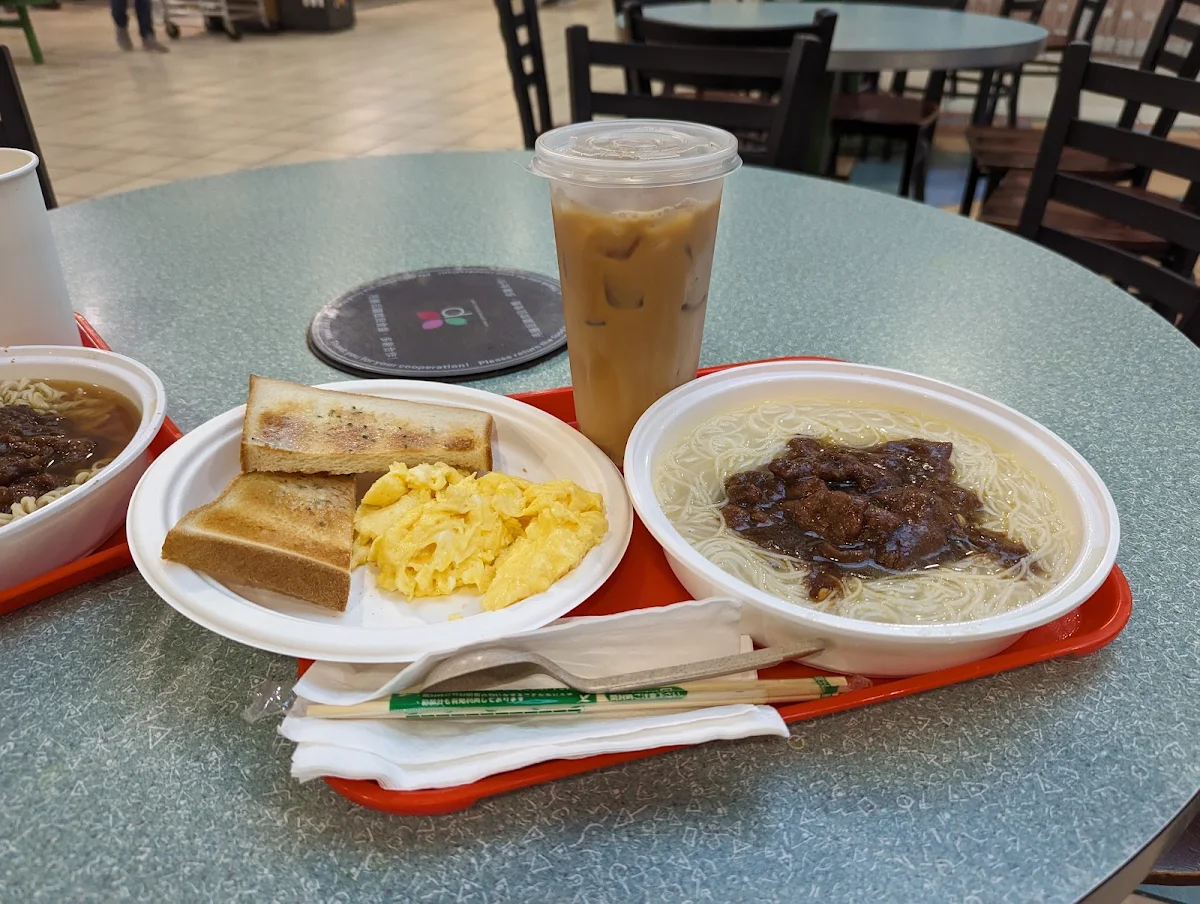 Satay Beef Noodle with Scrambled Eggs and Toast and Cold Milk Tea