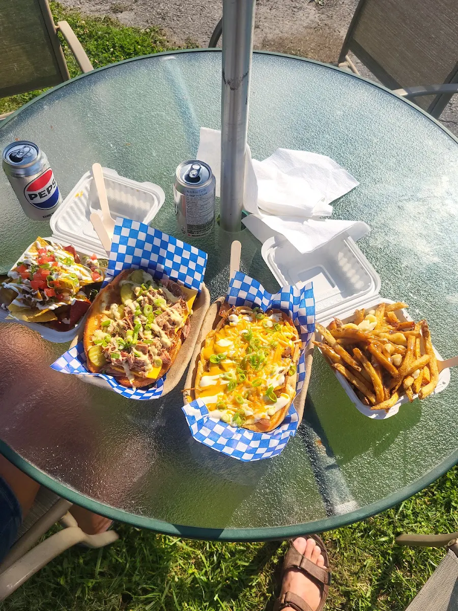 Cubano Sandwich with Nachos Supreme and Philly Cheesesteak with Mini Poutine