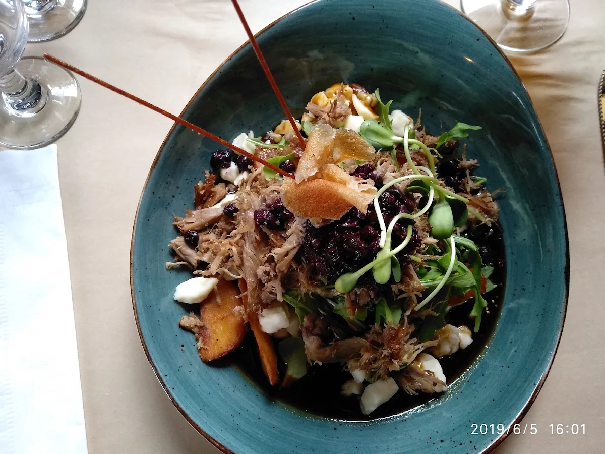 Leg of Duck Confit Roasted Potatoes and Thai Salad
