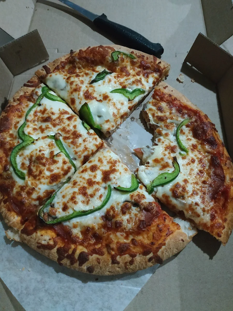 Une Bonne Petite Pizza
