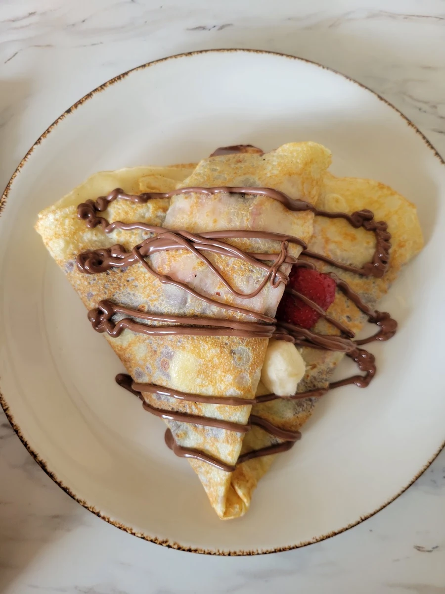 Strawberry Banana and Nutella Crepe with Whipped Cream