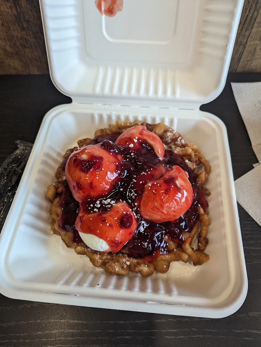 Funnel Cake with Vanilla Ice Cream and Strawberry Sauce