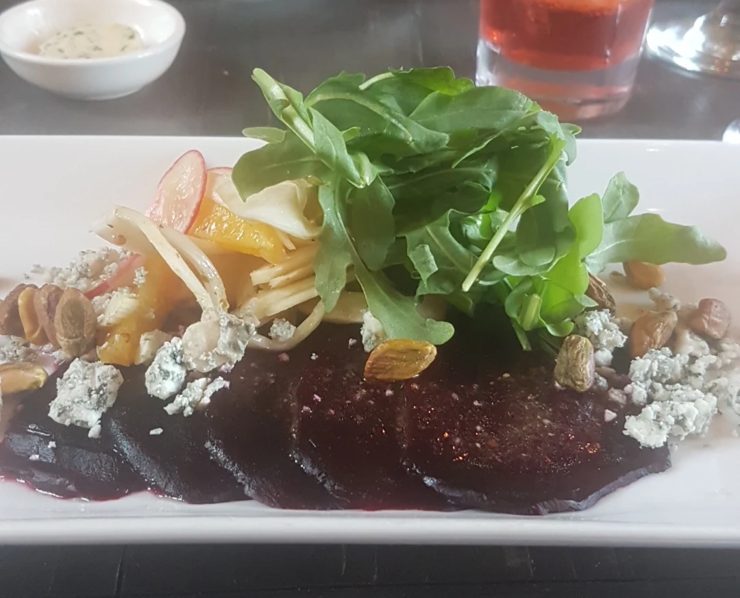 Beet Carpaccio with Blue Cheese Pistachios and Arugula