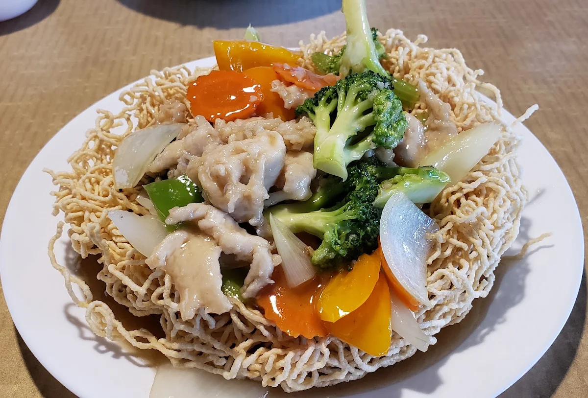 Stir-Fried Chicken Prawns and Vegetables on Crispy Noodle