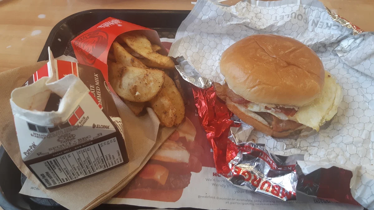 Wendy's Famous Burger with Tomatoes Bacon and Cheese Wendy's Golden Brown Fries