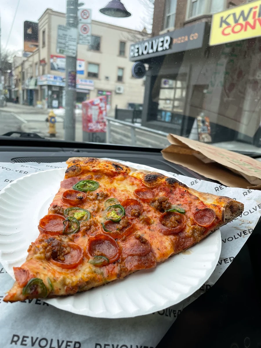 Sausage Jalapeño Pepperoni Pizza Slice
