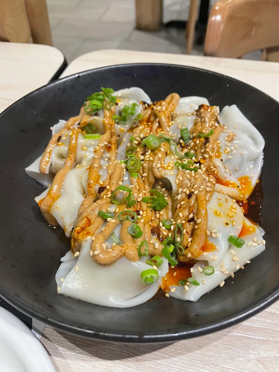Dumplings Au Porc Avec Sauce Au Sésame