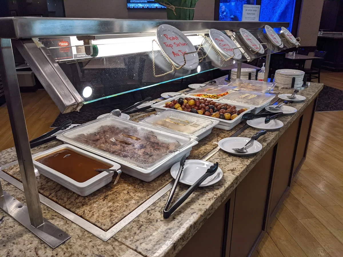 Hot Food Buffet with Roast Beef Veggies Fish and Potatoes