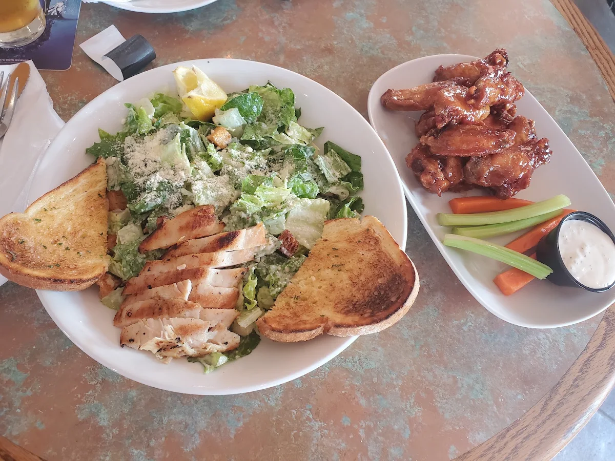 Chicken Caesar Salat and Buffalo Chicken Wings