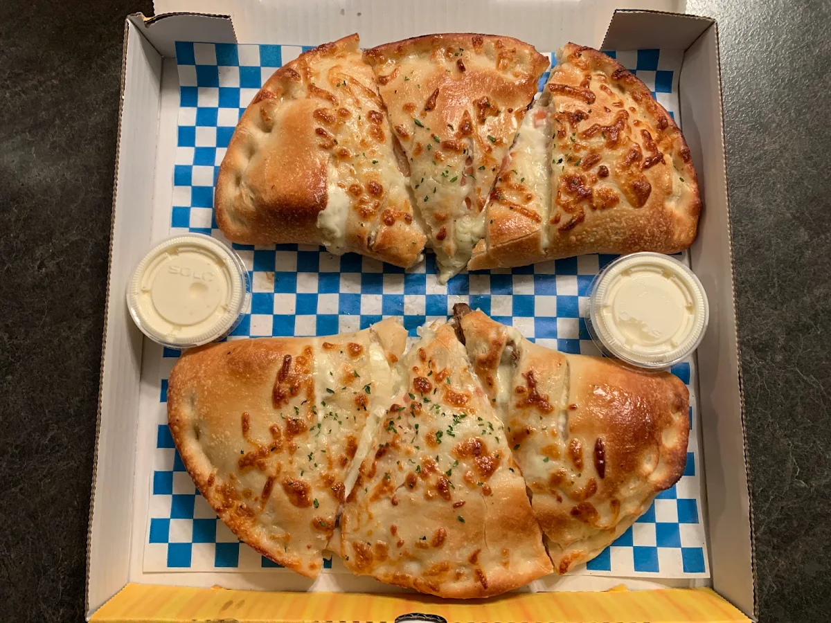Pepperoni Calzone and Hawaiian Calzone