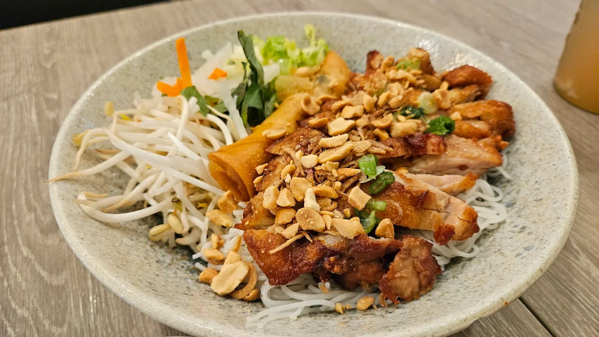 Bún GÀ Nướng Chả Giò Lemongrass Chicken on Vermicelli with Spring Rolls