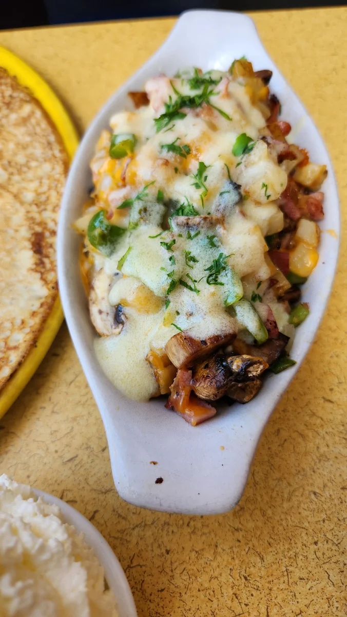 Mushrooms Green Peppers Onions Cheddar and Hollandaise Sauce to Your Hash Browns