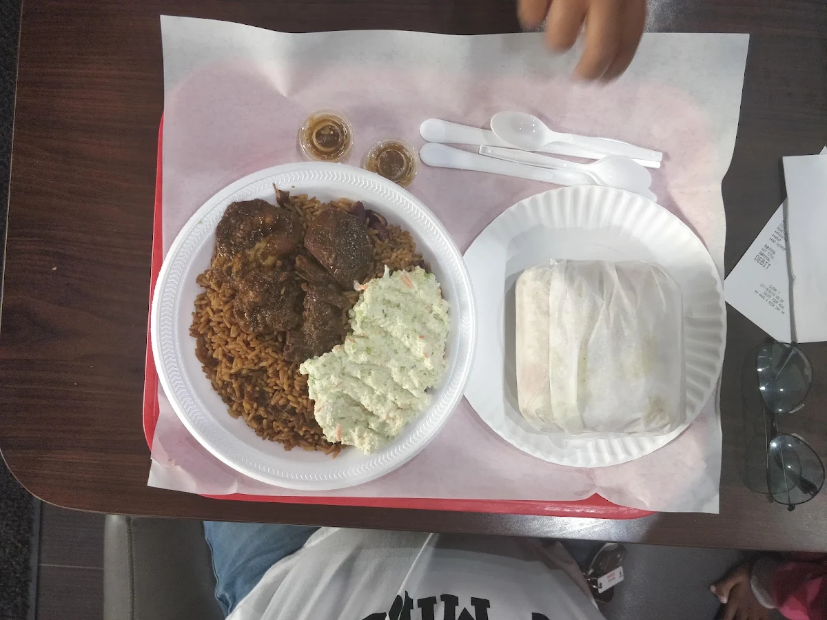 Jerk Chicken with Peas Pulao and Boneless Goat Curry with Roti