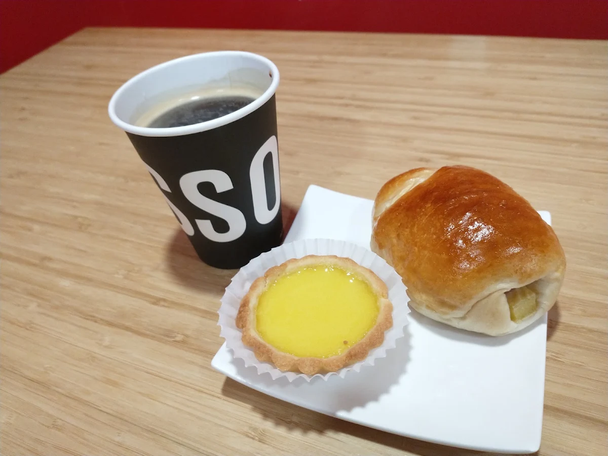 Egg Tart and Ham and Egg Bun with an Americano Coffee