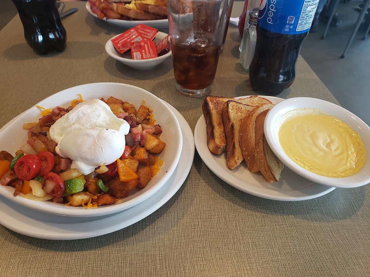 Brunch Skillet with Poached Eggs and Sourdough Toast