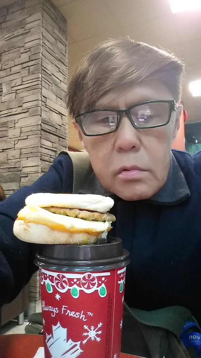 Coffee Sausage and Egg and Cheese English Muffin