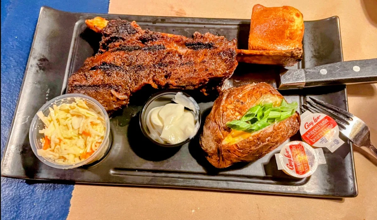 Baked Potato and Caesar Salad and Beef Ribs