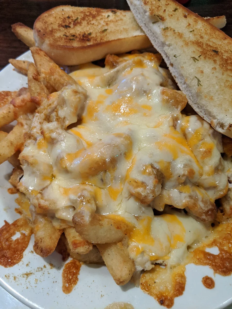 Chicken Curry Poutine, Paddy's Irish Brewpub & Rosie's Restaurant