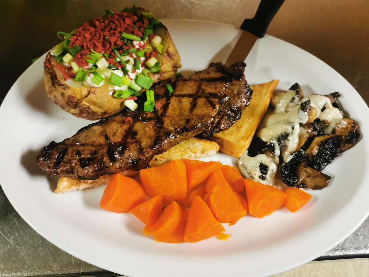 Steak Sandwich with Sauteed Greek Mushrooms and Loaded Baked Potatoe