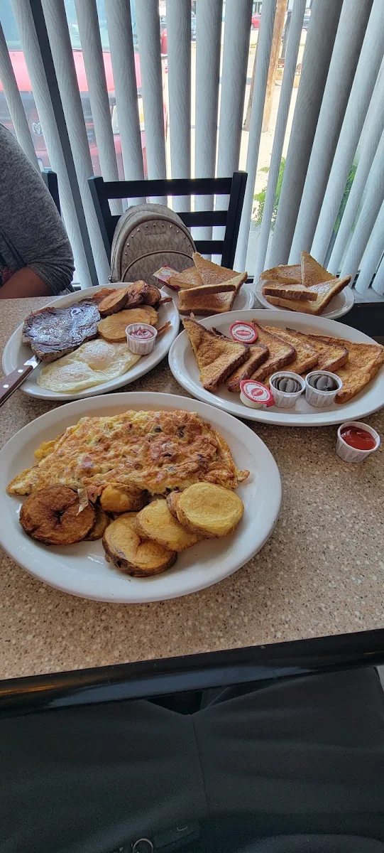 Meat Lovers Omelette French Toast Steak and Eggs